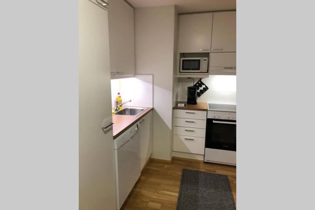 Апартаменты Keskustan Kaksio 45 M2 Autopaikalla, Rautatienkatu 19, 9 Krs Оулу Экстерьер фото